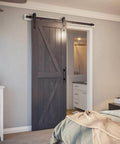 Sliding door with 5ft Barn Door Hardware Kit with I shape hanger, heavy duty carbon steel track, installed in bedroom doorway.
