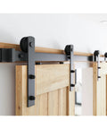 5FT Heavy Duty Double Door Sliding Barn Door Hardware Kit with carbon steel track installed, smooth and quiet nylon rollers visible