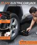 Heavy Duty 5 Ton Hydraulic Floor Jack Kit With Tire Inflator LED Light for Cars SUVs Sedans in use near tire