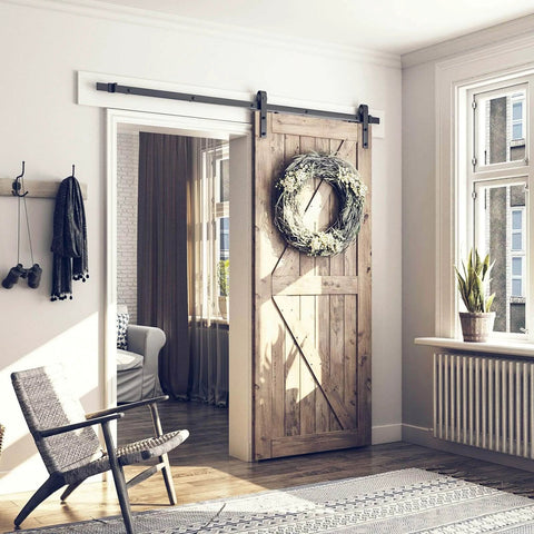6.8FT Barn Door Hardware Kit with J Shape hanger installed in living room, sliding barn door track system with rustic wood panel