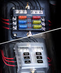 Six Circuit Blade Fuse Block With Negative Bus And LED Indicator Waterproof Cover For 12V Automotive Cars Marine Boats RVs Trailers ATO And ATC Fuses 30A Per Circuit 100A Panel in installed position with transparent cover.
