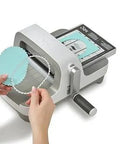 All In One 6 Inch Die Cutting And Embossing Machine Starter Kit with cutting dies shown in use, compatible with Sizzix Big Shot