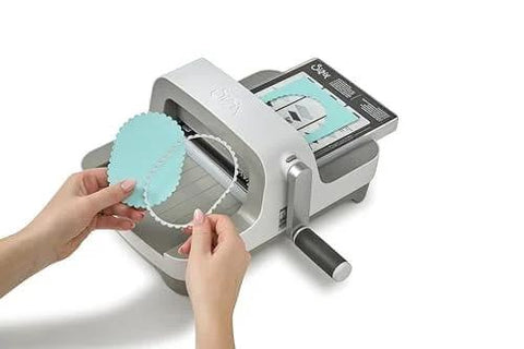 All In One 6 Inch Die Cutting And Embossing Machine Starter Kit with cutting dies shown in use, compatible with Sizzix Big Shot