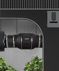 Cloudline Pro S6 6 Inch Inline Duct Fan installed in grow tent for ventilation, connected to hydroponic setup. Black finish.