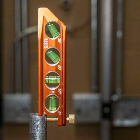 Compact 6-Inch magnetic torpedo level with a V-groove for conduit work delivers hands-free stability on metal surfaces, features 0/30/45/90 degree vial markers, patented magnet track, and thumb screw attachment for precise, quick layout