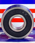 Front view of 6000-2RS Ball Bearing 10x26x8mm - Sealed - C3, showing rubber seals and chrome steel on a striped background.