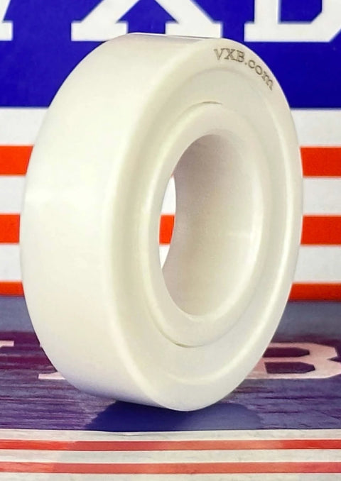 Close-up of 6003-2RS Full Ceramic Sealed Bearing 17x35x10mm ZrO2, showing white zirconia structure with PTFE seal.