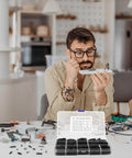600Pcs M3 Nylon Hex Spacer Standoffs And Screws Assortment Kit used for PCB mounting with man working on electronics