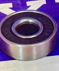 608-2RS Ball Bearing for Mobility Equipments - 8x22x7mm Made In Japan on a blue background.