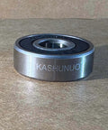 Close-up of 608 Ball Bearing Set for Skateboard 20 Pcs 8x22x7mm 2RS Double Rubber Sealed with visible brand marking.