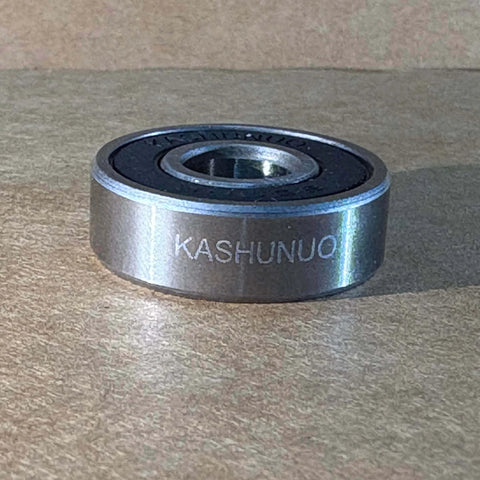 Close-up of 608 Ball Bearing Set for Skateboard 20 Pcs 8x22x7mm 2RS Double Rubber Sealed with visible brand marking.