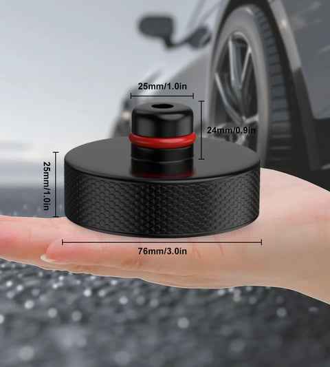 Close-up of black round floor jack pad for Tesla vehicles, knurled edge, 76mm diameter
