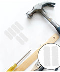 Pro Grade Nylon Hidden Fasteners For Wood Shelves And Cabinets 100 Pack concealed furniture connectors on a work surface with tools.