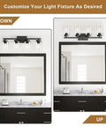 Top Shelf Four Light Bathroom Vanity Fixture With Slick Matte Black Frame And Knockout Clear Glass Shades above mirror view