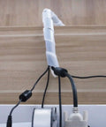 Half Inch 20 Ft Spiral Cable Wrap for wires organizing cords neatly on a desk, showing its flexible flame-retardant PE cover in white.