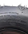 Close-up of Beefy 16x8-7 ATV Tire with load rating and pressure specifications, fits 50-125cc ATVs.