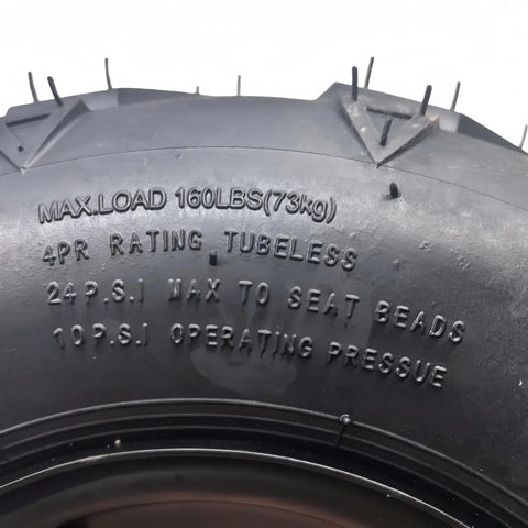 Close-up of Beefy 16x8-7 ATV Tire with load rating and pressure specifications, fits 50-125cc ATVs.