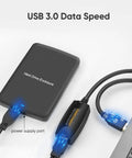 Active USB 3.0 Extension Cable 16.4 Ft 5M Male To Female With Signal Booster and Gold Plated Connectors shown with hard drive enclosure