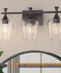 Two Pack Clear Glass Lamp Shade In Wine Cup Shape For Pendant Lights Chandeliers And Vanity Fixtures, shown on vanity light fixture
