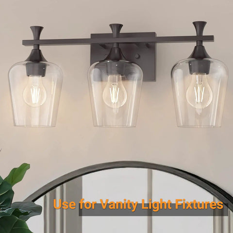 Two Pack Clear Glass Lamp Shade In Wine Cup Shape For Pendant Lights Chandeliers And Vanity Fixtures, shown on vanity light fixture