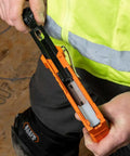 Person loading Heavy Duty Insulated Staples For Romex And NM Cables 19 32 By 11 32 Inch Boss Grade Secure Install stapler