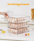 Stacked clear 24 Egg Storage Organizer For Fridge, BPA Free Stackable Egg Holder showing hand opening drawer on countertop.