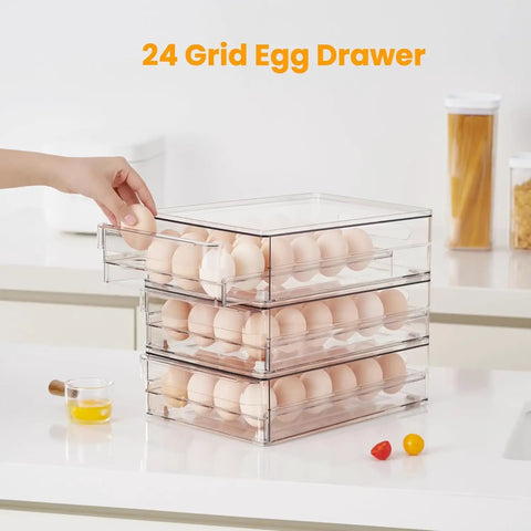 Stacked clear 24 Egg Storage Organizer For Fridge, BPA Free Stackable Egg Holder showing hand opening drawer on countertop.