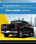 Rear view of Dodge Ram 1500 DT with Rear Tow Hook Cover 68299112AC, compatible 2019-2024, featuring city skyline.
