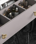 Open drawer with 6 Pack Zinc Alloy Drawer Knobs Champagne Bronze Cabinet Knobs With Flower Design, displaying contents inside.