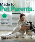 Woman sitting on floor with husky dog, text 'Made for Pet Parents' promoting pet odor reducing filter by Think Crucial.