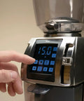 Heavy Duty Commercial Coffee Grinder Featuring 54 Mm Ceramic Flat Burrs For Cranking Out Perfect Espresso Grinds with control panel.