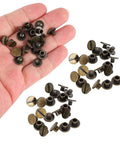 Hand holding 30 Pack Brass Book Rivets With Knurling Flat Leather Binding Buttons for DIY craft, bronze finish, 9.5 by 4mm nails