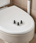 8 Piece Toilet Seat Mounting Kit With Expanding Screws Rubber Washers And Nuts For Metal Mounting Hardware DIY Friendly Tool Free Installation Black Universal Fit Secure And Stable Fixation on white toilet seat