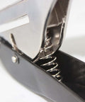 Close-up of Ergonomic Handheld 1 Hole Paper Punch 8mm Diameter Full Metal Puncher spring mechanism.
