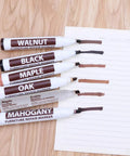 Wood repair markers in walnut, black, maple, oak, and mahogany shades with test lines. Walnut Wood Repair Marker Upgrade Kit For Fast Furniture Scratch Fix Pen With Wax Sticks And Sealant Easy DIY Restorer For Floors Cabinets Tables Beds And Cars Nicks Discoloration And Scratches Busted.