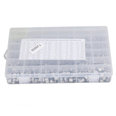 1520Pcs SMD Electrolytic Capacitor Kit With 36 Values From 1uF To 1000uF Aluminum Storage Box Pro Grade Gear For Automotive DIY Electronics Networking And Lighting Projects, clear plastic box with capacitors visible inside