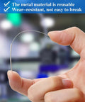 Close-up of a hand holding a 0.4 mm stainless steel 3D printer nozzle cleaner from a Bulk 50 Pieces 0.4 mm Stainless Steel 3D Printer Nozzle Cleaning Kit.