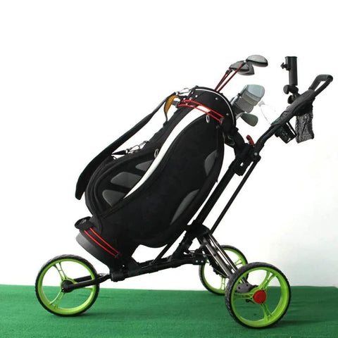 Slick Foldable Three Wheeled Golf Cart Crafted From Solid Aluminum Alloy with golf bag, green wheels on putting green.