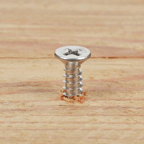 Built Tough Size Six By Three Eighth Inch Flat Head Phillips Wood Screw in wood, 304 stainless, ideal for decking and carpentry.