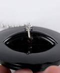 Bathtub Drain Stopper with Rubber Bath Plug, close-up view showing black rubber material and attached chain.