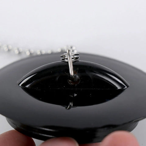Bathtub Drain Stopper with Rubber Bath Plug, close-up view showing black rubber material and attached chain.
