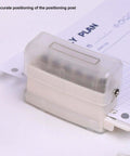 Close-up of Heavy Duty Do It All 6 Hole Paper Puncher Portable Adjustable Metal Hole Punch With Chip Tray showing positioning pillar.