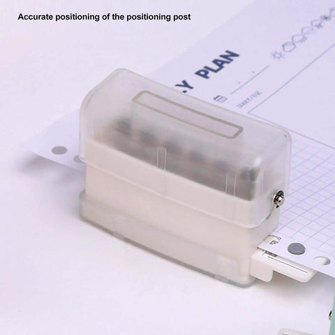 Close-up of Heavy Duty Do It All 6 Hole Paper Puncher Portable Adjustable Metal Hole Punch With Chip Tray showing positioning pillar.