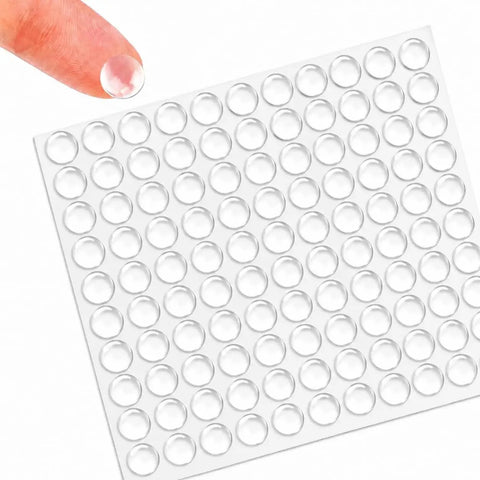 One Hundred Piece Clear Self Adhesive Cabinet Door Bumpers Three Eighth Inches Silicone Rubber Stoppers For Kitchen Drawers And Furniture To Halt Heavy Door Slams Cold Turkey on adhesive sheet
