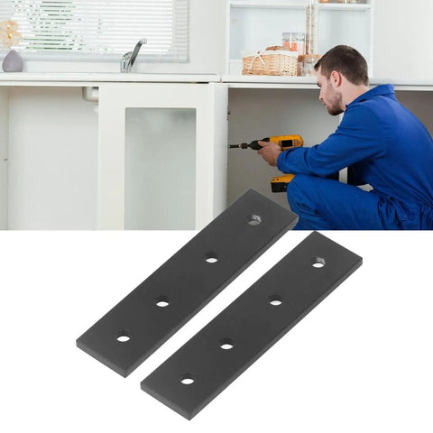 Two Pack 4 Hole Aluminum Connecting Plates with worker assembling kitchen cabinet