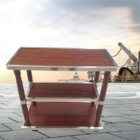 Tough As Nails Heavy Duty Industrial Kitchen Cart With Smooth Rolling Wheels And Built In Wine Rack Three Tier Storage Trolley side view with wood and metal design.