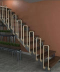 Tough As Nails Industrial Pipe Railing Featuring Slick Non Slip Iron Guardrail on indoor staircase with wooden steps.
