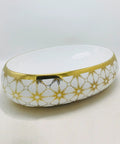 Modern Ceramic Oval Vessel Sink For A Total Bathroom Glow Up Featuring Super Sleek Gold Basin, 600x410x155mm, smooth glazed surface.
