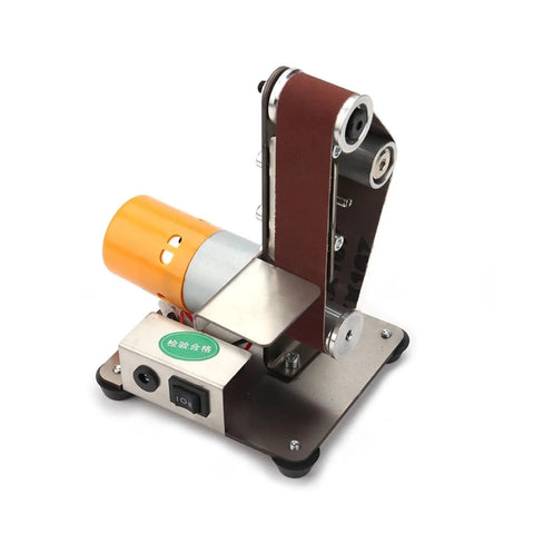 Dial Up Precision With This Versatile Electric Belt Sander And Mini Bench Grinder. Compact orange motor with a sanding belt.