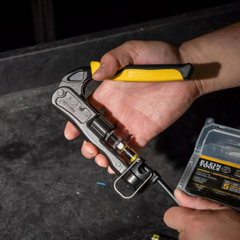 Person using Pro Grade Heavy Duty Compression Crimper for wire and coaxial cabling, crimping connector, durable zinc die-cast